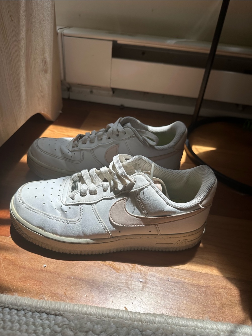 Nike White Low-Top Leather Sneakers with Light Pink Swoosh